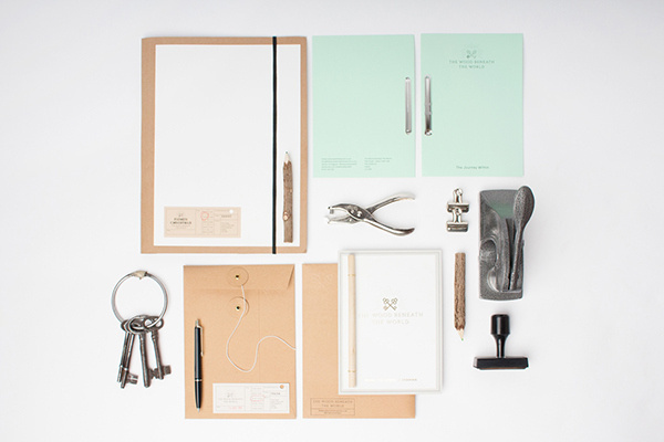 The Wood Beneath The World on Behance #stamp #branding #invitation #embossed #wood #trees #identity #envelope #gold #stationery #programme #ticket #foil #keys