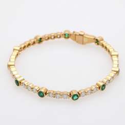 Gold bracelet with diamonds and emeralds,