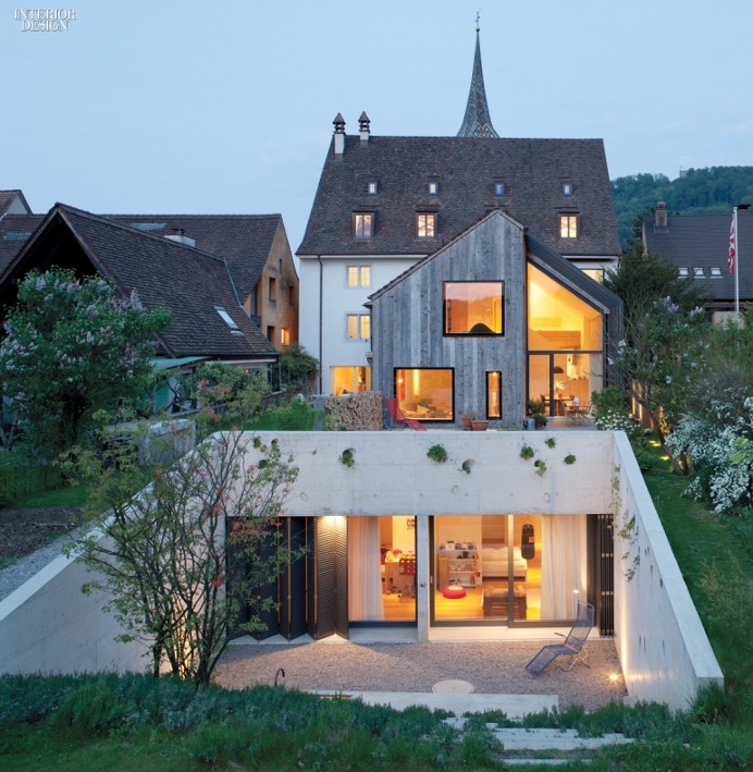 Oppenheim Architecture & Design Adapts Historic Swiss Farmhouse For Muttenz Office