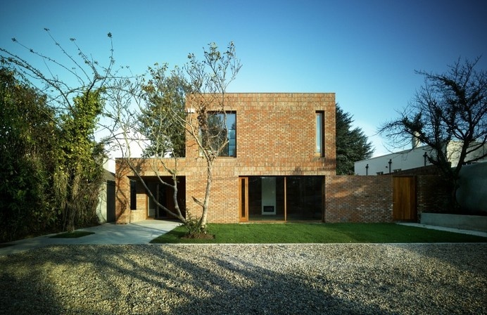 Renewed Home in Dublin Boasting Wooden Details And A Brick Fence Read more: http://freshome.com/architecture/#ixzz37rpLOiER