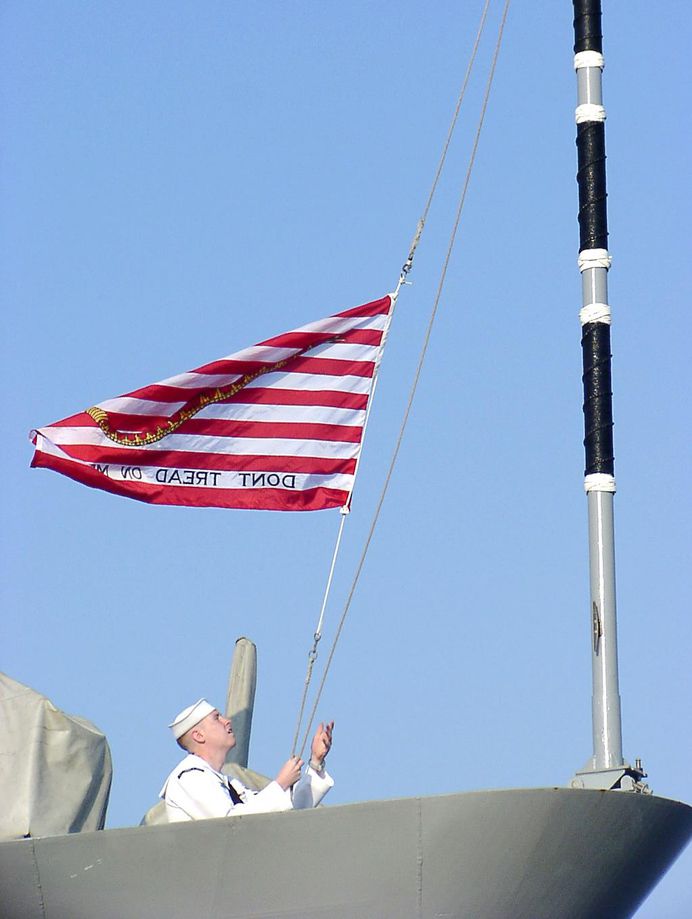 Raising of the “Navy Jack” for the first time at morning colors, on September 11, 2002, aboard the guided missile cruiser Thomas S. Gates in honor of those killed in the September 11, 2001 attacks.