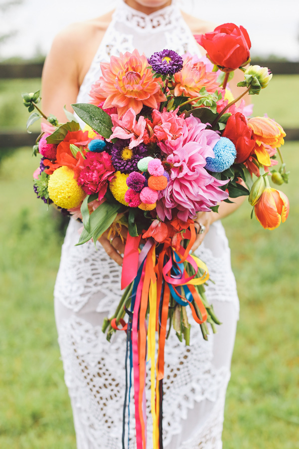 pom pom bouquets - photo by Lara Hotz http://ruffledblog.com/australian-polo-club-wedding #wedding #decoration #flowers #party