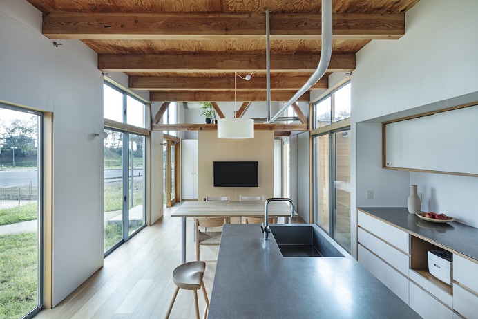 House in Field by Ship Architecture