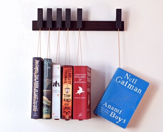 Hanging Book Shelving is a simple and unique way to display your book collection. #productdesign #industrialdesign #modern #furnituredesign