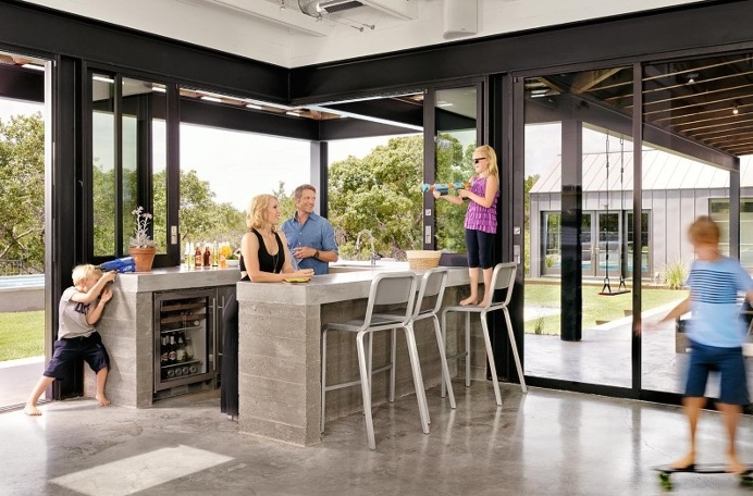 Farmhouse with minimalist glass and metal forms