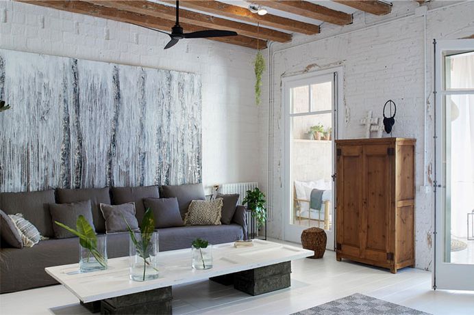 Brick Walls and Wooden Roof Structures Give Character to Barcelona Apartment #livingroom #decor #interior