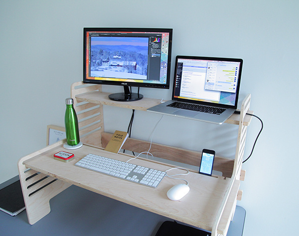 The UpStanding Desk is an affordable, portable and adjustable addition to your desk that makes your standard desk into a standing one. #modern #design #office #home #product #furniture #industrial #style