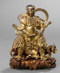 Lacquer gilded Bronze of Zhenwu on a carved wooden base