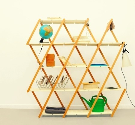 The Set shelving contains a beech-wood frame with scissor-like pivots as well as folded steel shelves which sit over rails between each join #saving #modern #design #home #space #product #furniture #industrial #style
