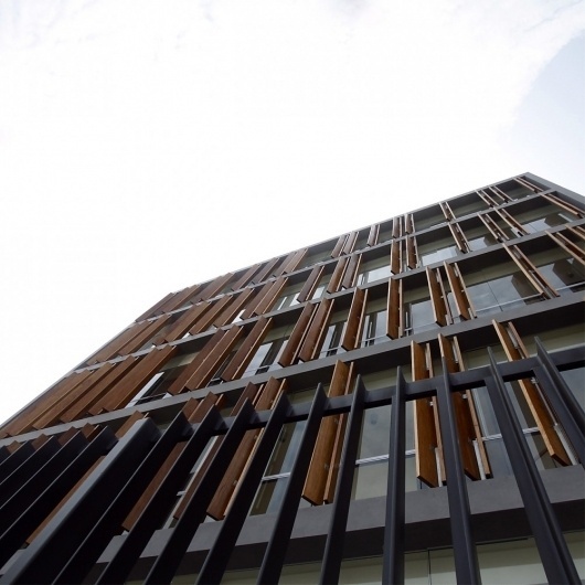 Architecture Photography: Office Building / Fernando Mosquera and Llona + Zamora Arquitectos - Philippine Consulate / Fernando Mosquera and Llona + Za #timber #facade #architecture #mechanized