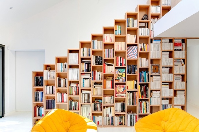 Bookshelf House is an Old House Converted into a Light-Filled Residence