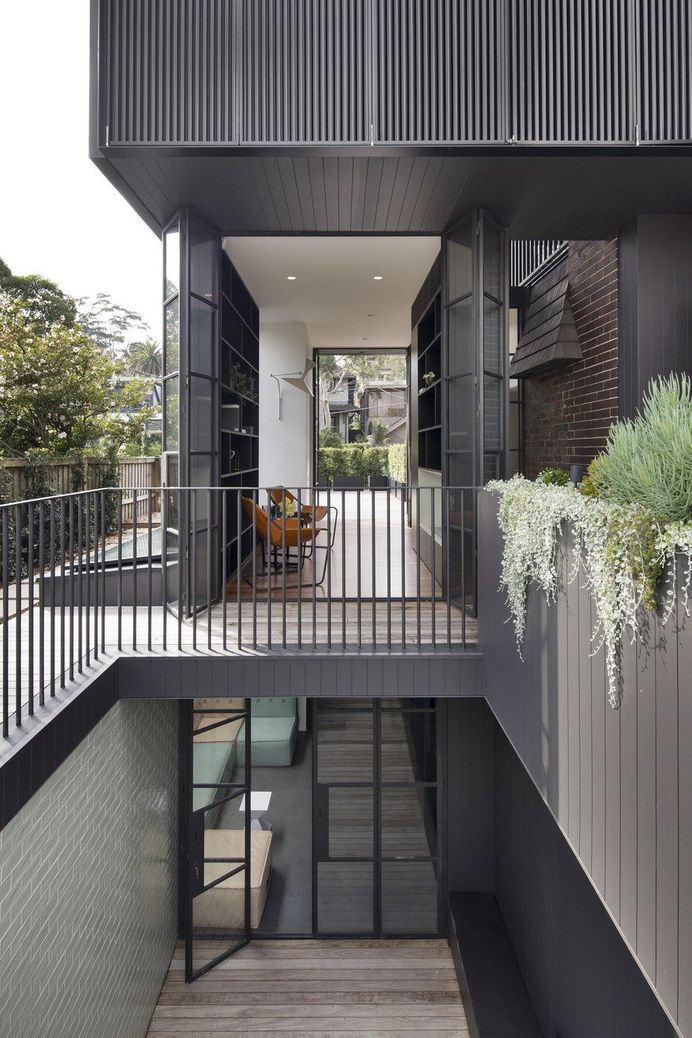 Three Story Side Addition to a 1920s Two Storey Brick House 4