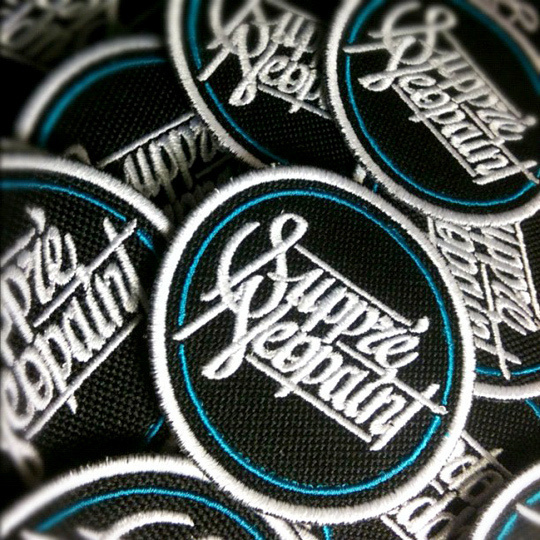 Suppré Patch. #script #budapest #suppre #patch #logo #danielblik #typography