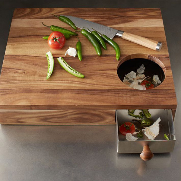 Storage Cutting - This cutting board has a hole in one corner that allows you to sweep peelings and trimmings into a hidden metal drawer th #kitchenware #cutting #board #knife