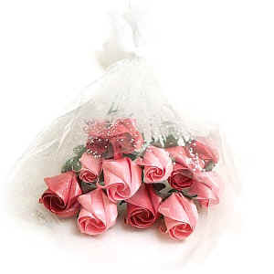You can make this u-n-me origami rose bouquet by making 12 single standard roses (http://www.origami-make.org/howto-origami-valentines.php)