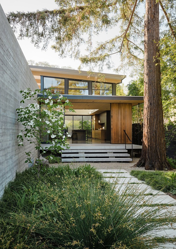 Modern home with Exterior, House Building Type, Wood Siding Material, and Concrete Siding Material.