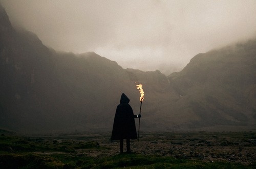 Sleepless Dreams | untrustyou: Oscar Zabala #mysterious #torch #mist #photography #fire #figure #valley #hood #mountains