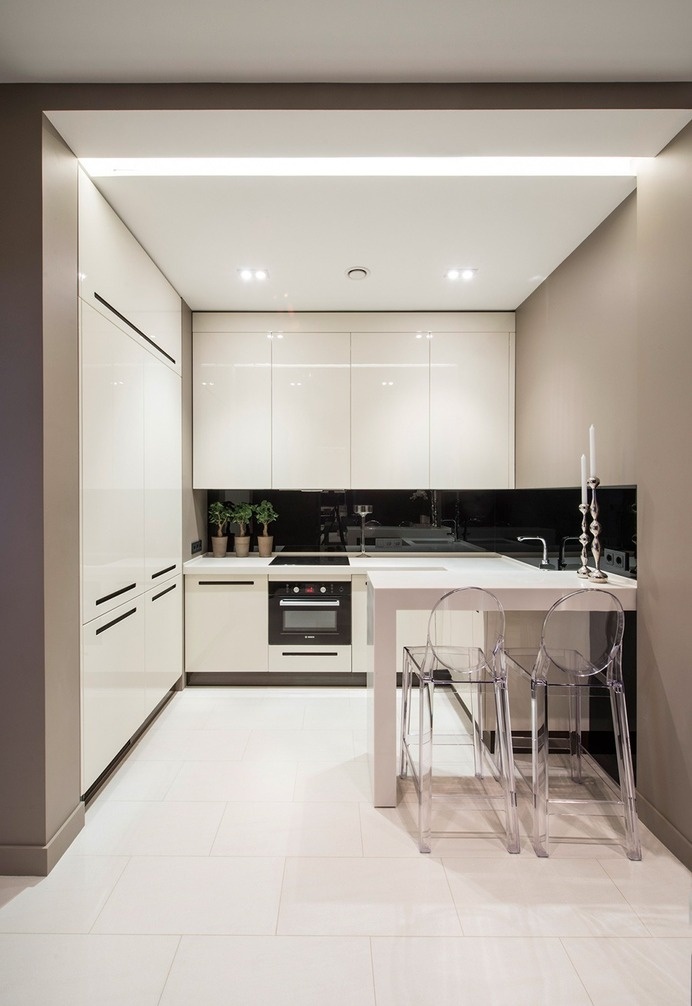 Tiny Small Compact White Kitchen With Floor To Ceiling Cupboards