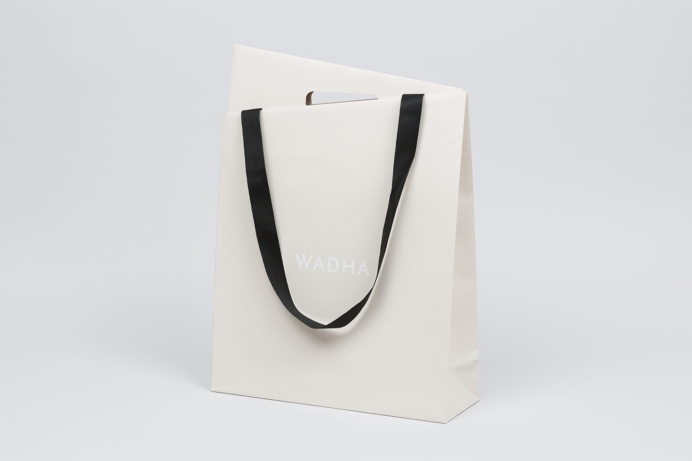 Wadha Doha Branding corporate design white black deluxe luxury minimal logo logotype Shopping Bag Two Times Elliott www.mindsparklemag.com
