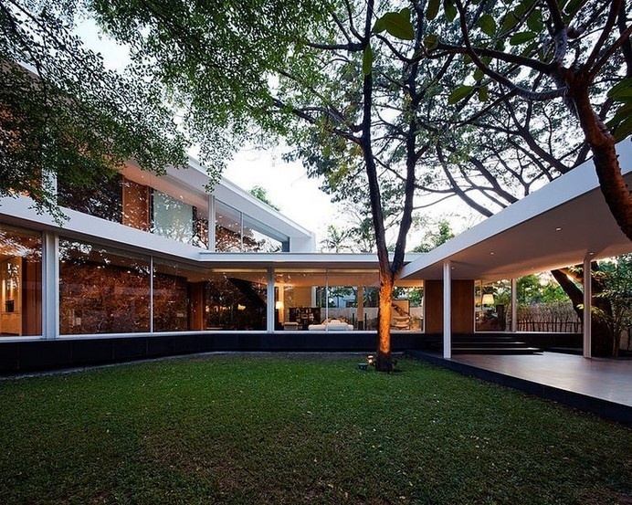 Contemporary Bangkok Residence Defined by Interconnected Glass Volumes #modern #contemporary #glass #architecture #residence