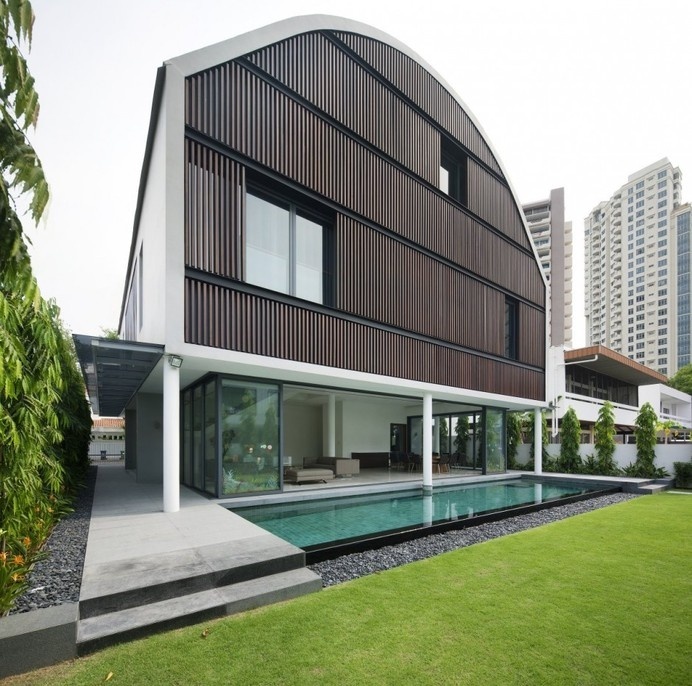 Modern Wind Vault House Displaying a Quirky Barn-Like Roof in Singapore #architecture #modern