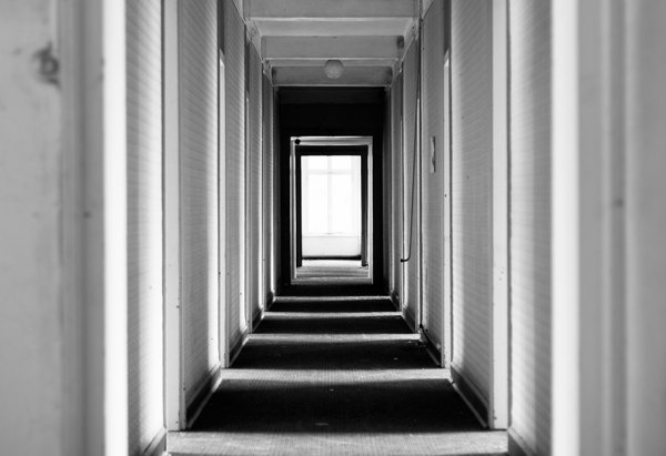 Zebra Corridor #urban #urbex #white #photo #door #exploring #corridor #black #photography #hotel #light