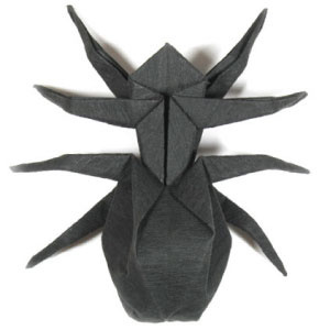 How to make a traditional origami spider (http://www.origami-make.org/howto-origami-halloween.php)