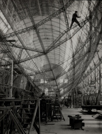 Skeleton of Graf Zeppelin - we make money not art #steel #white #zeppelin #construction #black #flying #and