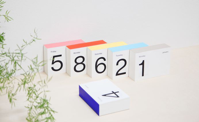 Blue Calendar by Studio Aboarrage “Blue Calendar is a hand bound block-calendar. The simple design of the 365 pages show the date and day of the week and moon phases. Size A6: 14 x 10 x 4,2 cm. The calendar can be used on your desk or attached to the...