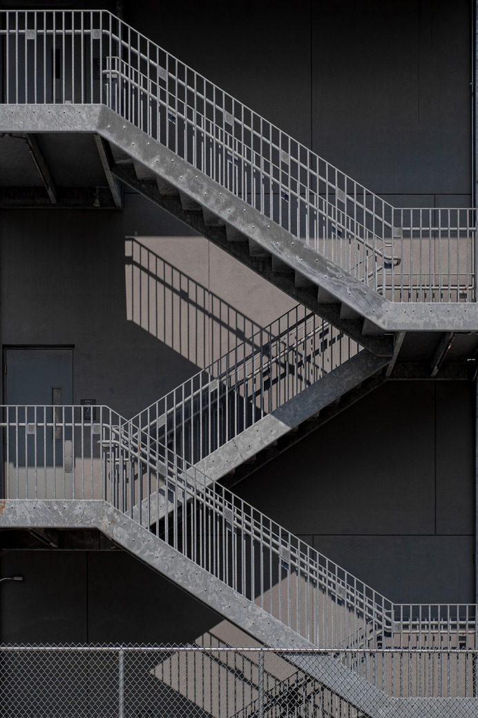 A switchback staircase and shadows.