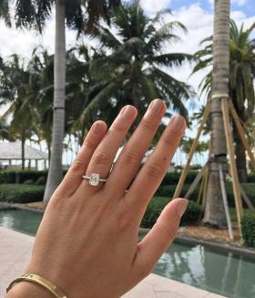 Stunning emerald cut solitaire engagement ring