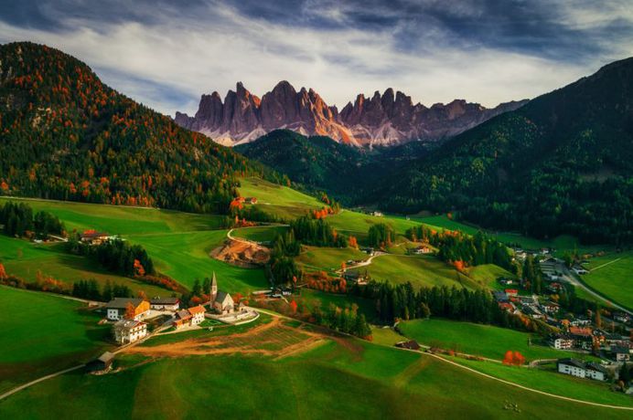Santa Maddalena village in front of the Geisler or Odle Dolomites Group, Val di Funes, Trentino Alto Adige, Italy, Europe by Valentin Valkov