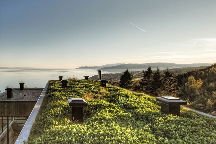 Malbaie V Residence is Fully Covered with a Green Roof