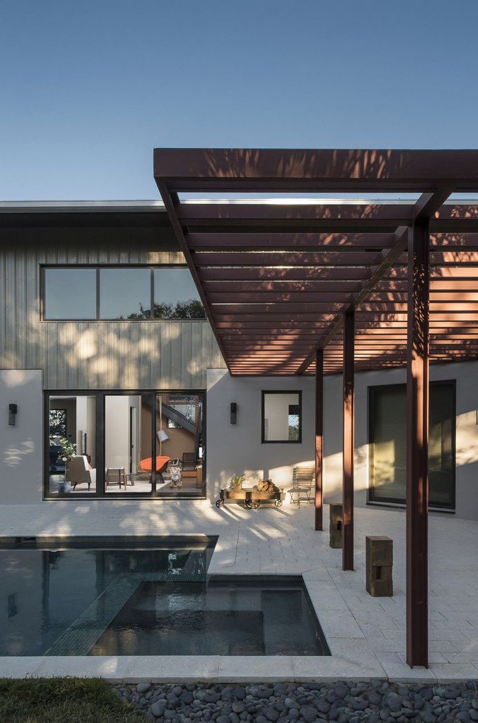 Interstruct, Inc. Turned a Former Parking Lot into a Warm and Modern Home 3