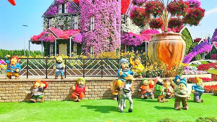 Dwarfs family at the Dubai Miracle Garden. These dwarfs can be assumed at the builders of the Dubai Miracle Garden.