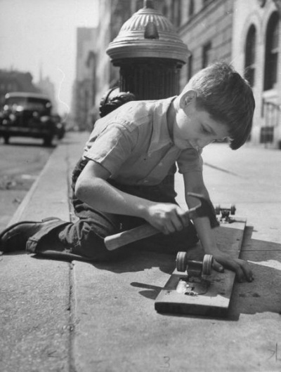 WELCOME TO RADICAL SKATE KIDS! 1947 fruitcratescooter making #1940s #1947 #white #kid #black #radical #wheel #skate #and #metal