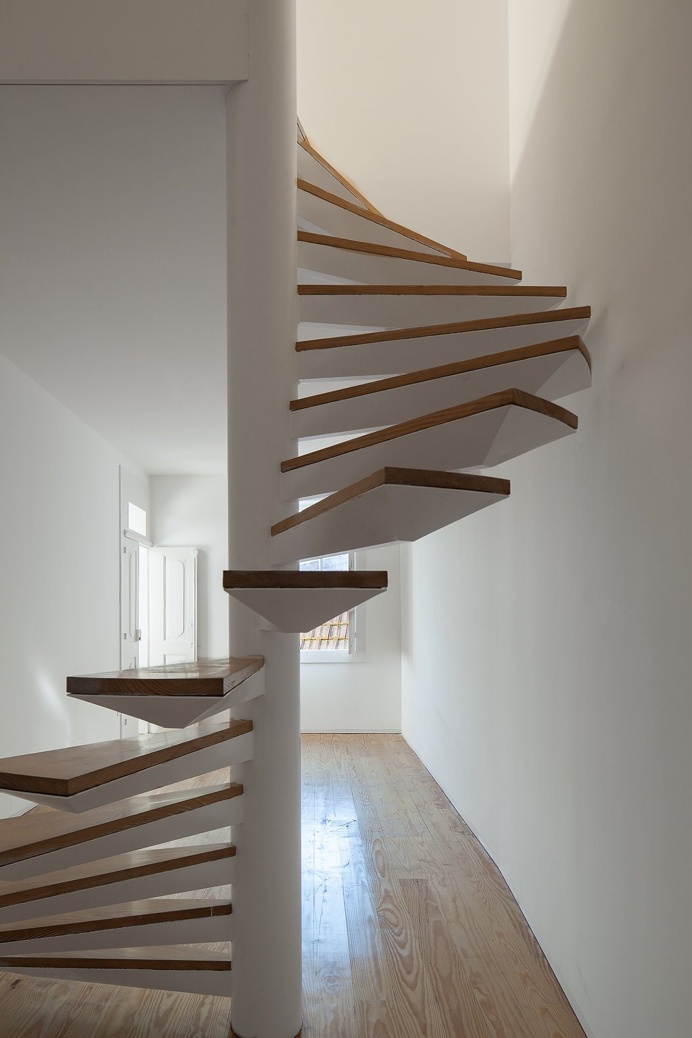 Two Houses in Largo do Trovador by Pitagoras Group. #pitagorasgroup #minimalism #spiralstaircase #staircase