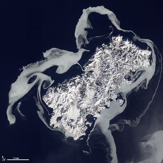 Sea Ice Surrounds Shikotan : Image of the Day #shikotan #photography #volcano #space