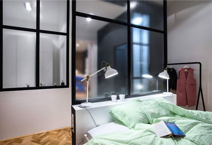 Apartment Renovation with Industrial Accents in Budapest - InteriorZine