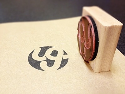 Dribbble - Usman Group Stamp by Usman Group #stamp #ink #branding #moleskin #print #logo #paper #typography