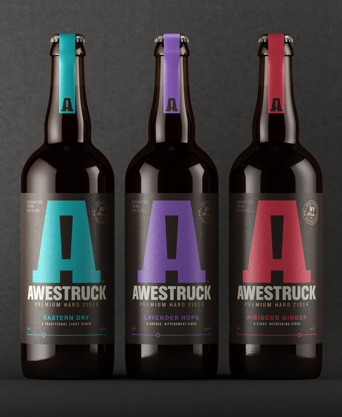 Logo and packaging treatment with laid paper and copper foil detail designed by Buddy for Awestruck Hard Cider #logo #colour #cider