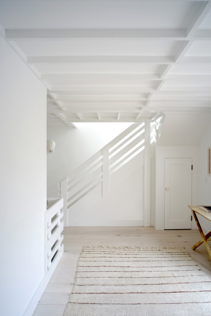 In the renovation of a Montauk beach house, Brooklyn architects Space Exploration painted the entire house in Benjamin Moore's Super White, with a flat finish on the walls and satin on the ceilings. Photograph courtesy of Space Exploration from our post The Simple Life: A Montauk Beach House for a Creative Couple.