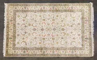 Oriental rug made of silk. 20. Century, approx. 287x199