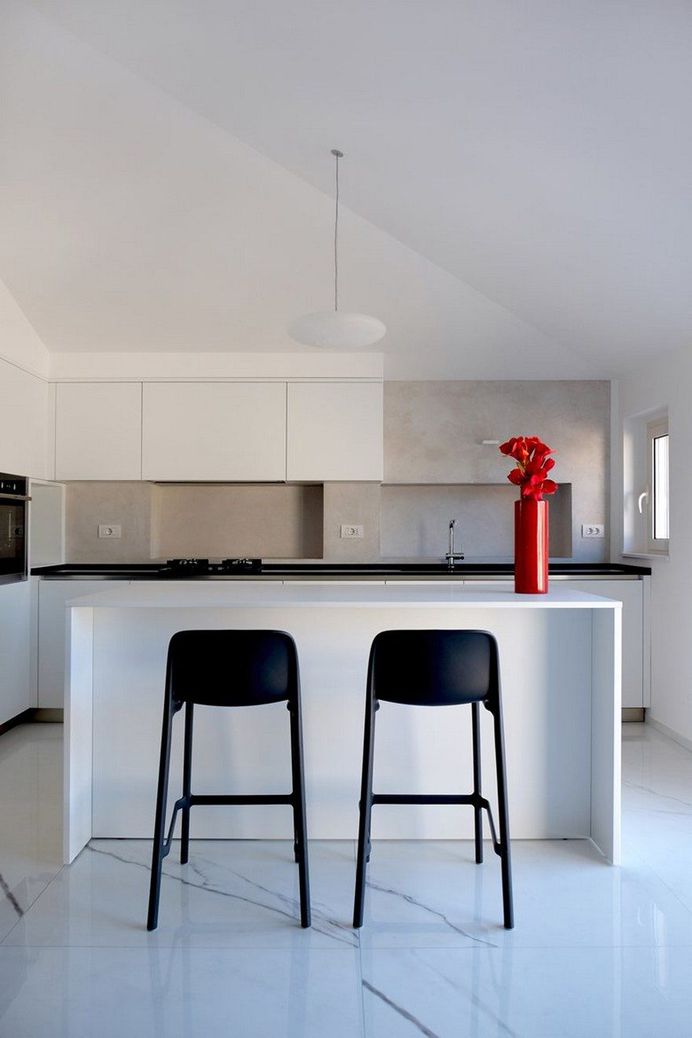 Renovation of an Attic Apartment in Corinaldo, Italy 1