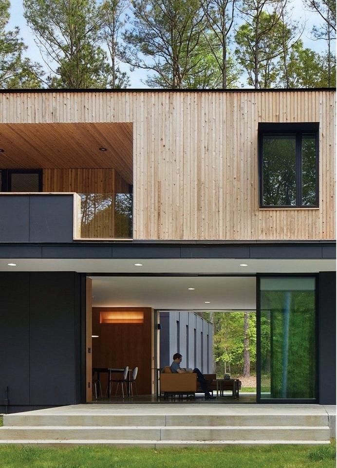 This Two-Story House Has a Central Living Room that Can Be Fully Opened for Inside/Outside Living 4