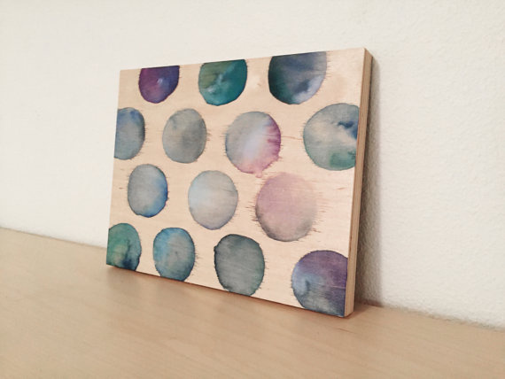 Watercolor circle painting on wood panel
