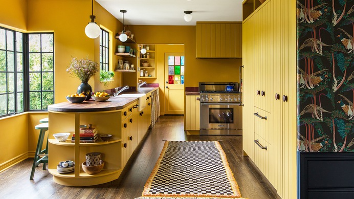 a yellow kitchen with fun patterns
