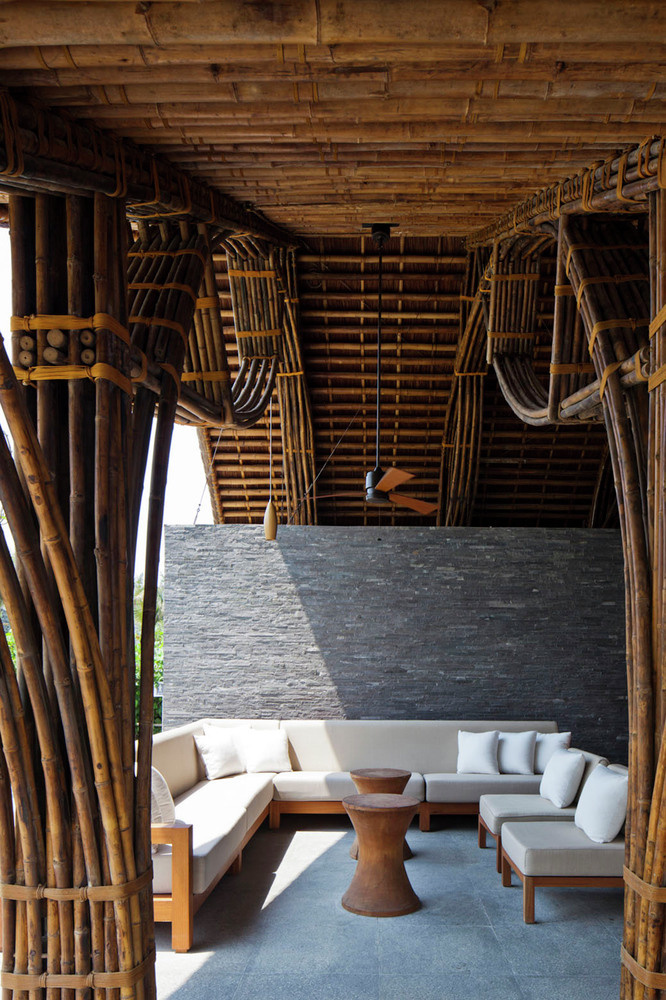 Beach bar in a tropical green resort complex