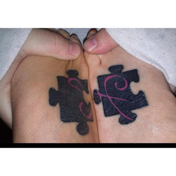 Black and Grey A Wristband Consisting Of Puzzle Pieces Tattoo Idea   BlackInk