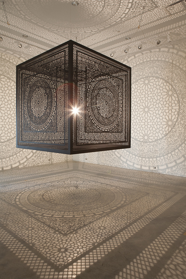 Intersections: An Ornately Carved Wood Cube Projects Shadows onto Gallery WallsFebruary 3 #wood #ornate #carved #shadows